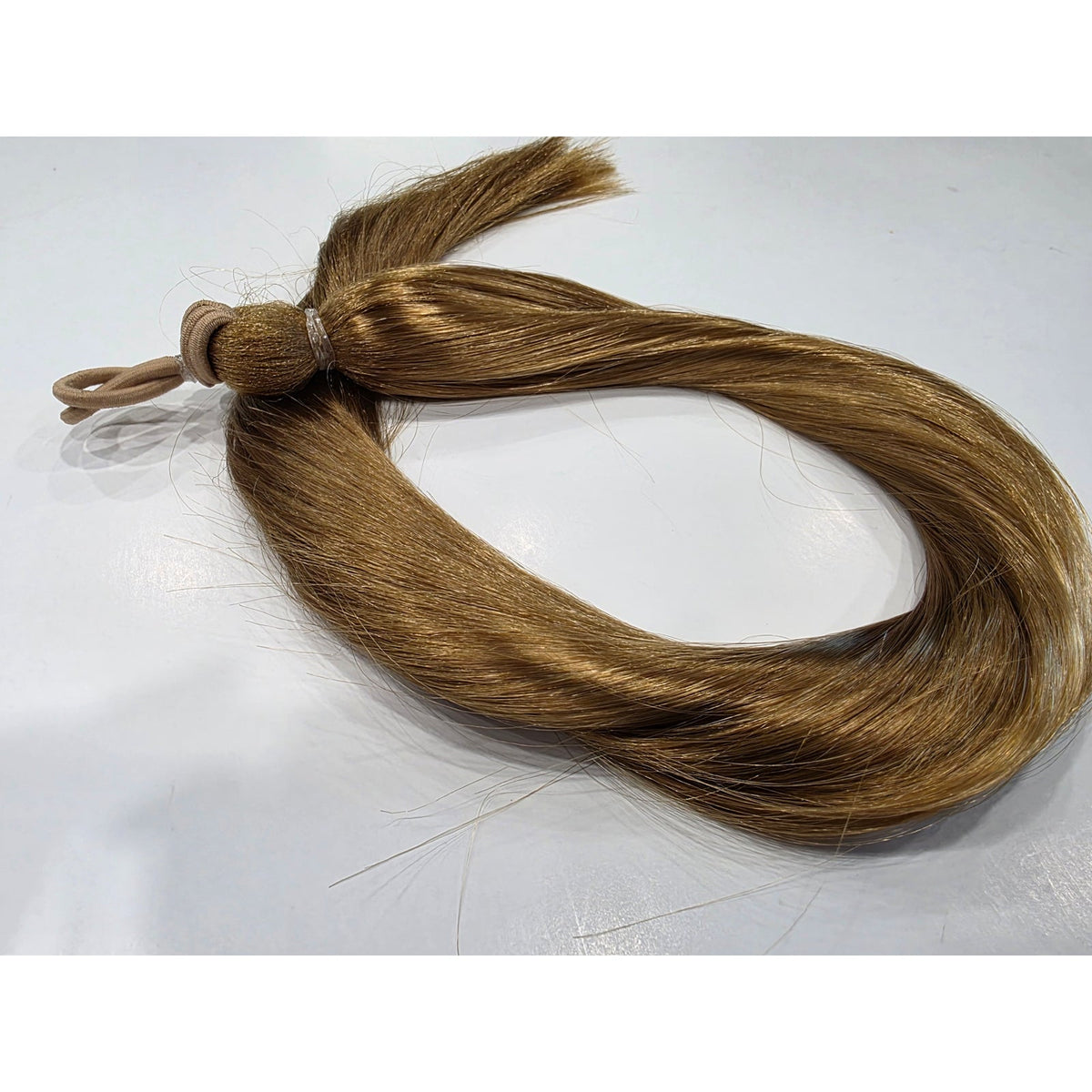 Dark golden blonde ponytail extension 24 inch, color 27 strawberry blonde hair fall